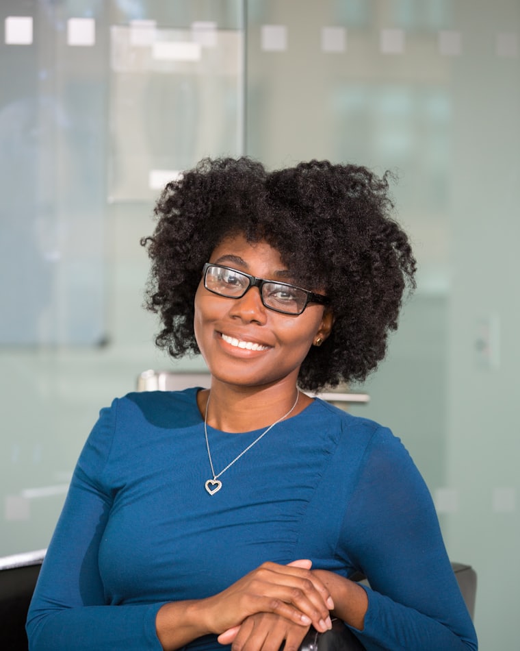 A job seeker at her desk in a Lagos office